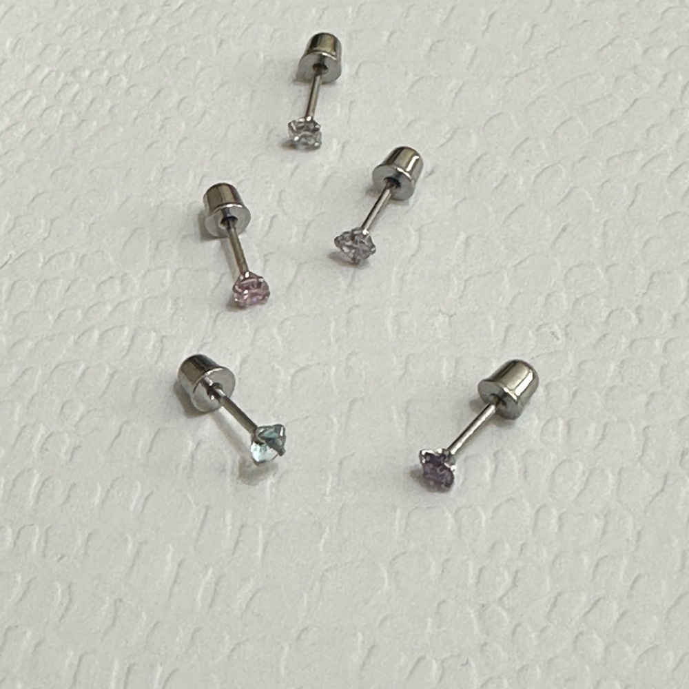 Five stainless steel screw back earrings